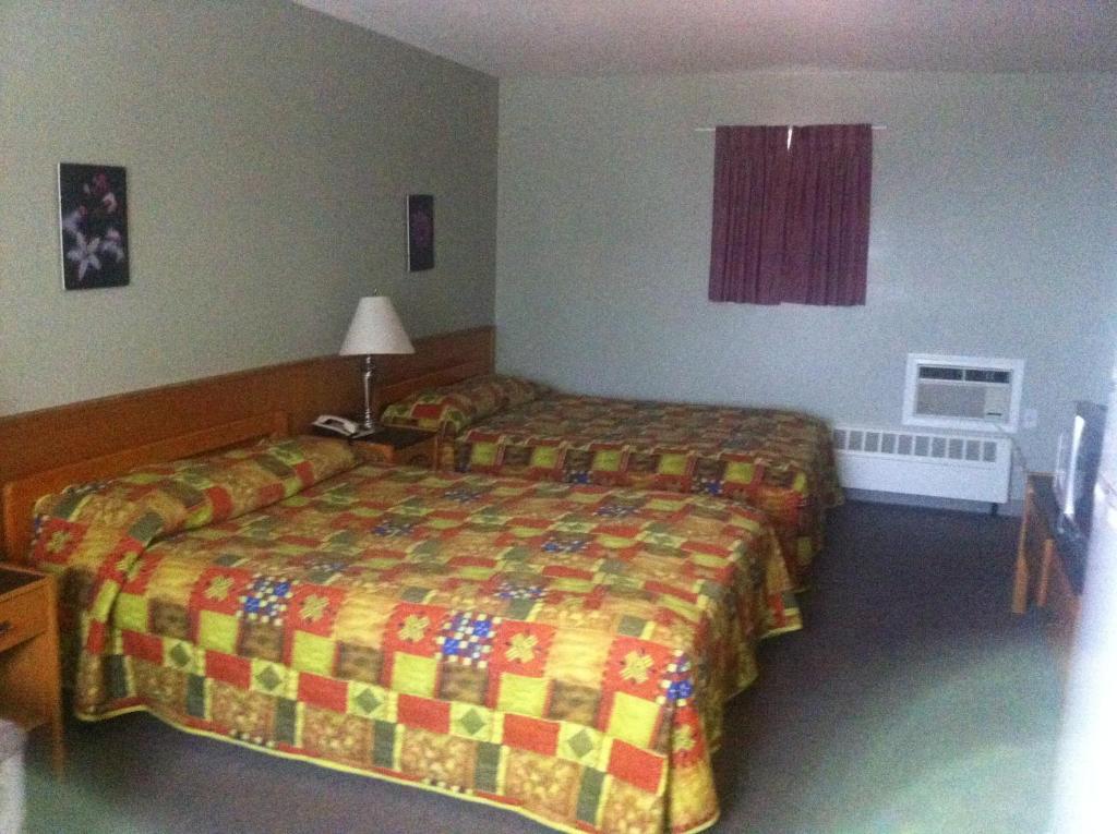 Raccoon Lodge Motel Sylvan Lake Szoba fotó